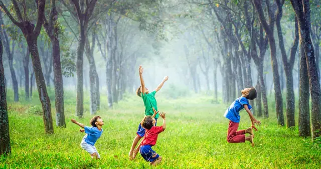 Children jumping outdoors